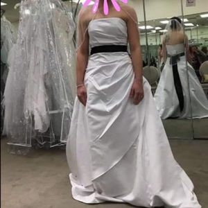 Wedding dress, navy blue sash, veil.